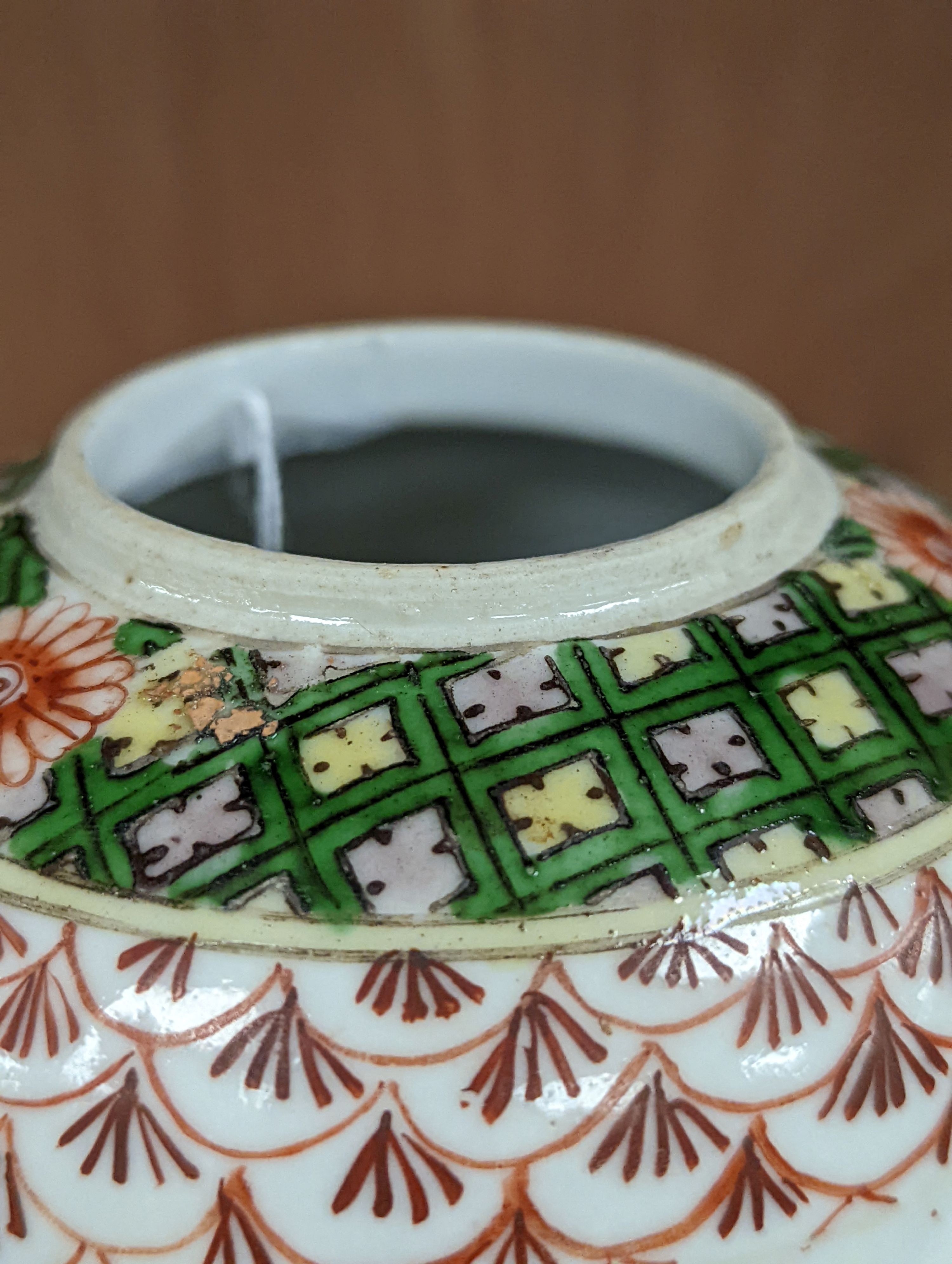 A Chinese famille verte ovoid jar, late 19th century, 19.5cm tall